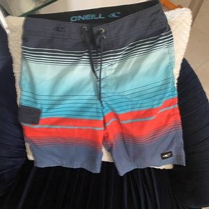 Boys size 26 O’Neil board shorts l